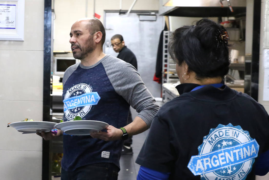 Made in Argentina restaurant owner Pablo Rodriguez serves lunch on Tuesday, Feb. 19, 2019, in Las Vegas. A thief stole $10,000 worth of cash, electronics, and empanadas when he broke into Rodrigue ...