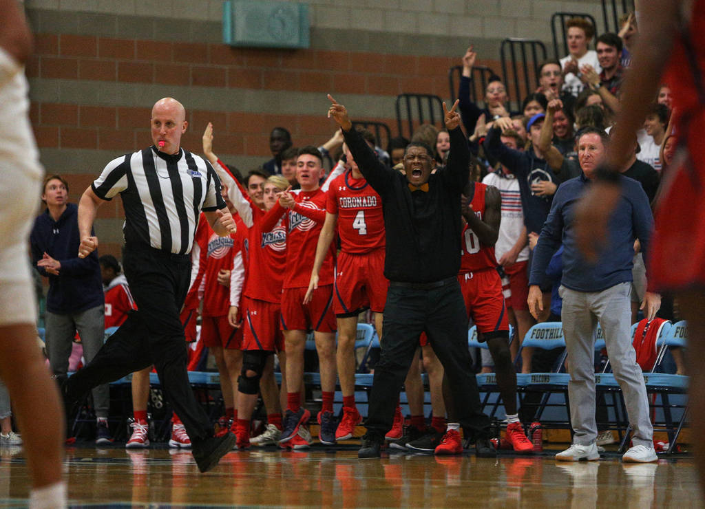 Coronado's bench cheers on the team as they play against Bishop Gorman High School during the Desert Region boys semifinal game at Foothill High Schoo in Henderson, Tuesday, Feb. 19, 2019. (Caroli ...