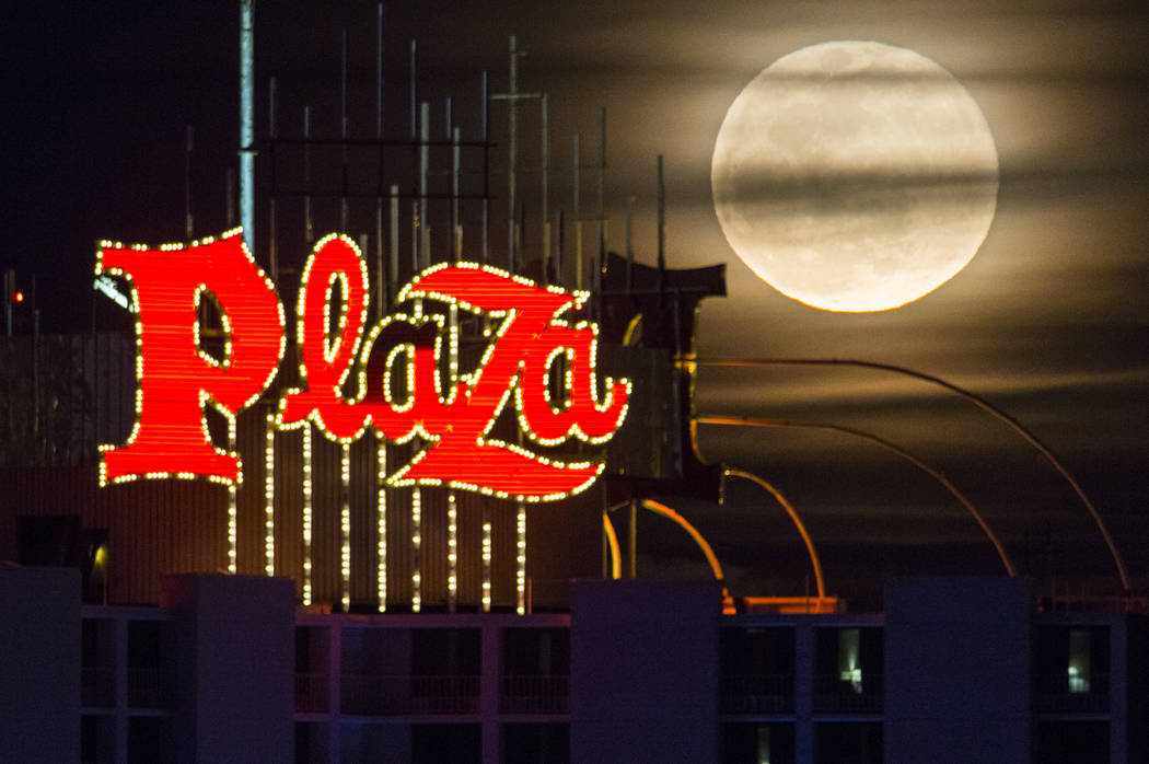 A super snow moon rises over the Plaza in downtown Las Vegas as seen from the World Market Center on Tuesday, Feb. 19, 2019. (Chase Stevens/Las Vegas Review-Journal) @csstevensphoto