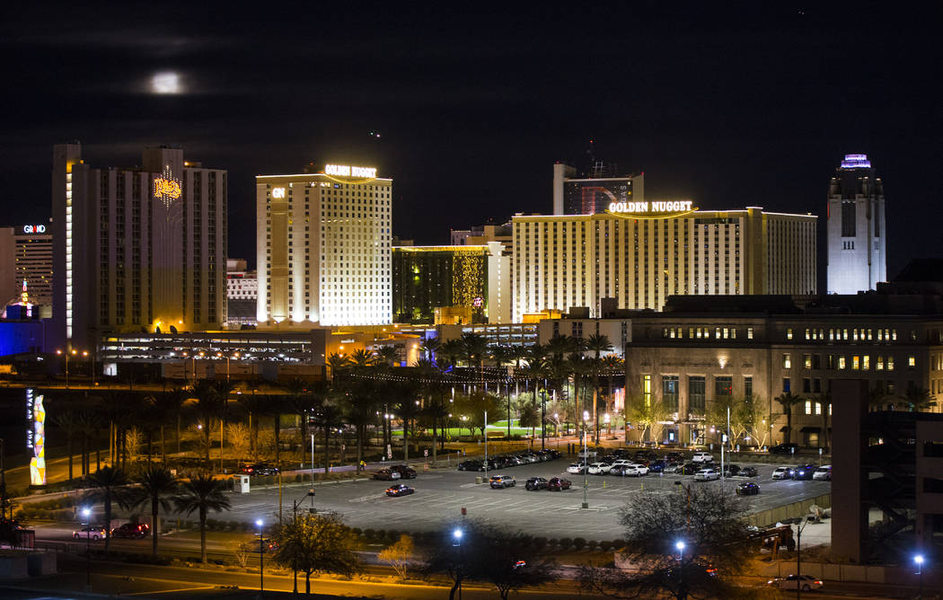 A super snow moon rises over the Plaza in downtown Las Vegas as seen from the World Market Center on Tuesday, Feb. 19, 2019. (Chase Stevens/Las Vegas Review-Journal) @csstevensphoto