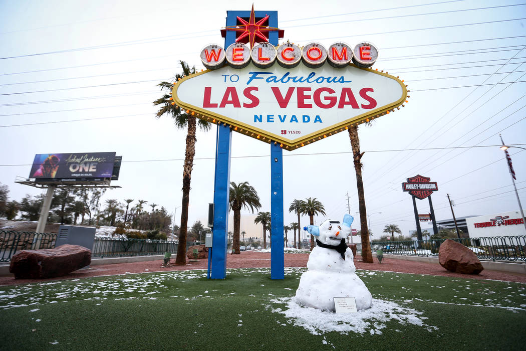 A snowman sits in front of the Welcome to Fabulous Las Vegas sign in Las Vegas, Thursday, Feb. 21, 2019. (Caroline Brehman/Las Vegas Review-Journal) @carolinebrehman