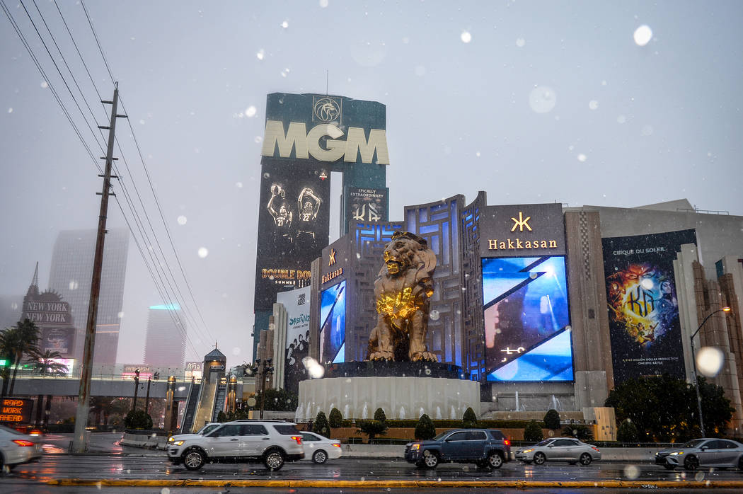 Snow falls outside of the MGM Grand hotel-casino on the Strip in Las Vegas, Thursday, Feb. 21, 2019. (Caroline Brehman/Las Vegas Review-Journal) @carolinebrehman
