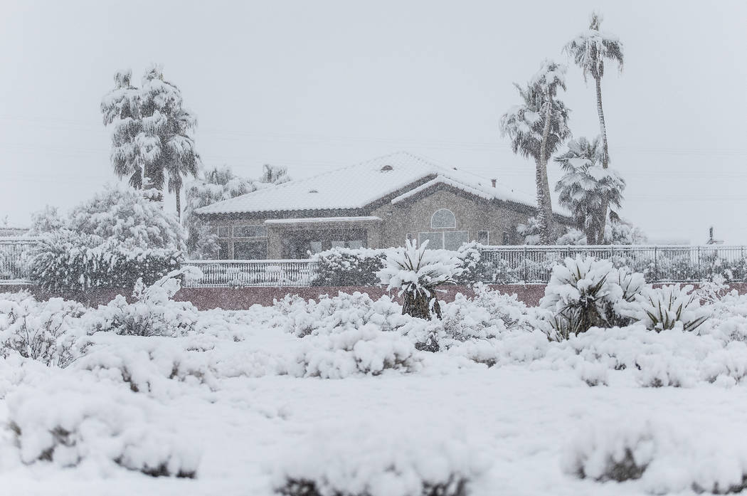 Homes in the northwest valley are covered in an early morning snow on Thursday, Feb. 21, 2019, in Las Vegas. (Benjamin Hager Review-Journal) @BenjaminHphoto