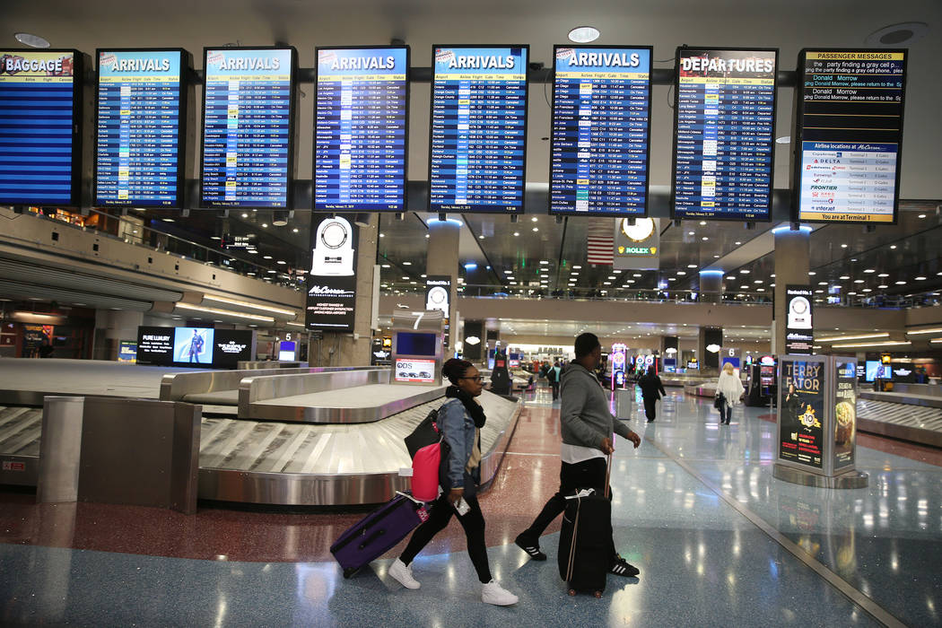 Flight departure screens at Terminal 1 show canceled and delayed flights to and from McCarran International Airport in Las Vegas, Thursday, Feb. 21, 2019. (Erik Verduzco/Las Vegas Review-Journal) ...