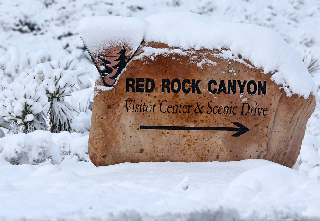 The Red Rock Canyon marker at Route 159 is covered in snow outside Las Vegas, Thursday, Feb. 21, 2019. (Heidi Fang /Las Vegas Review-Journal) @HeidiFang