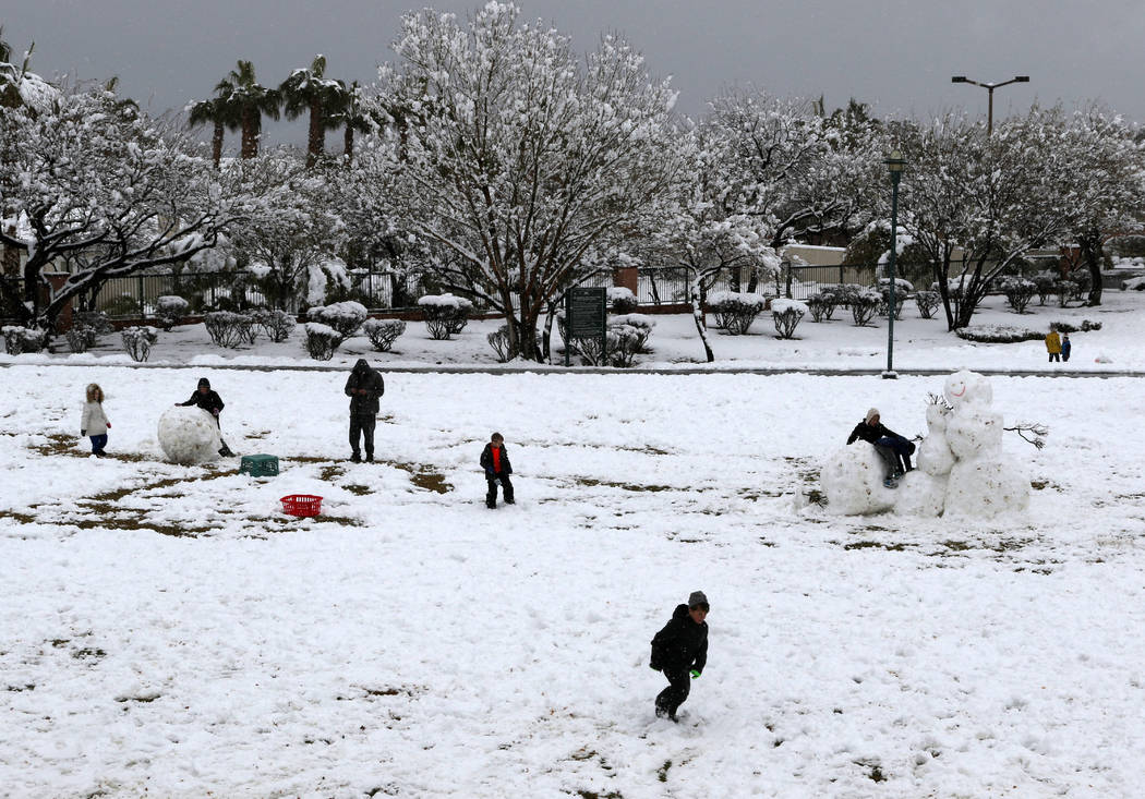 Las Vegans build snowmen and play in the snow at Arbors Tennis and Play Park in Summerlin in Las Vegas, Thursday, Feb. 21, 2019. (Heidi Fang /Las Vegas Review-Journal) @HeidiFang