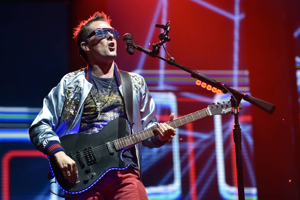 Matt Bellamy of Muse performs at Lollapalooza in Grant Park in Chicago, Aug 3, 2017. (Rob Grabowski/Invision/AP)