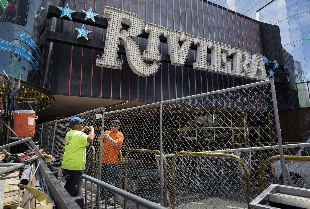 Workers from All-Star Fence assemble the perimeter surrounding the Riviera hotel-casino in Las Vegas, which closed Monday, May 4, 2015 after 60 years in business. (Mark Damon/Las Vegas News Bureau)