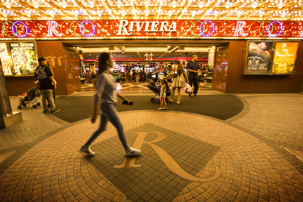 People walk in front of the Riviera hotel-casino in Las Vegas on Monday, April 20,2015. (Las Vegas Review-Journal)