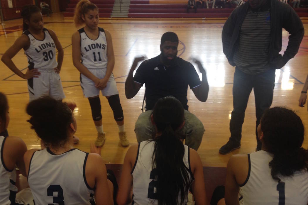 Calvary Chapel coach Shay Johnson talks to his team during the Lions' 40-33 win over Lincoln County in the Class 2A Southern Region championship game at Del Sol on Saturday, Feb. 23, 2019. Bartt D ...