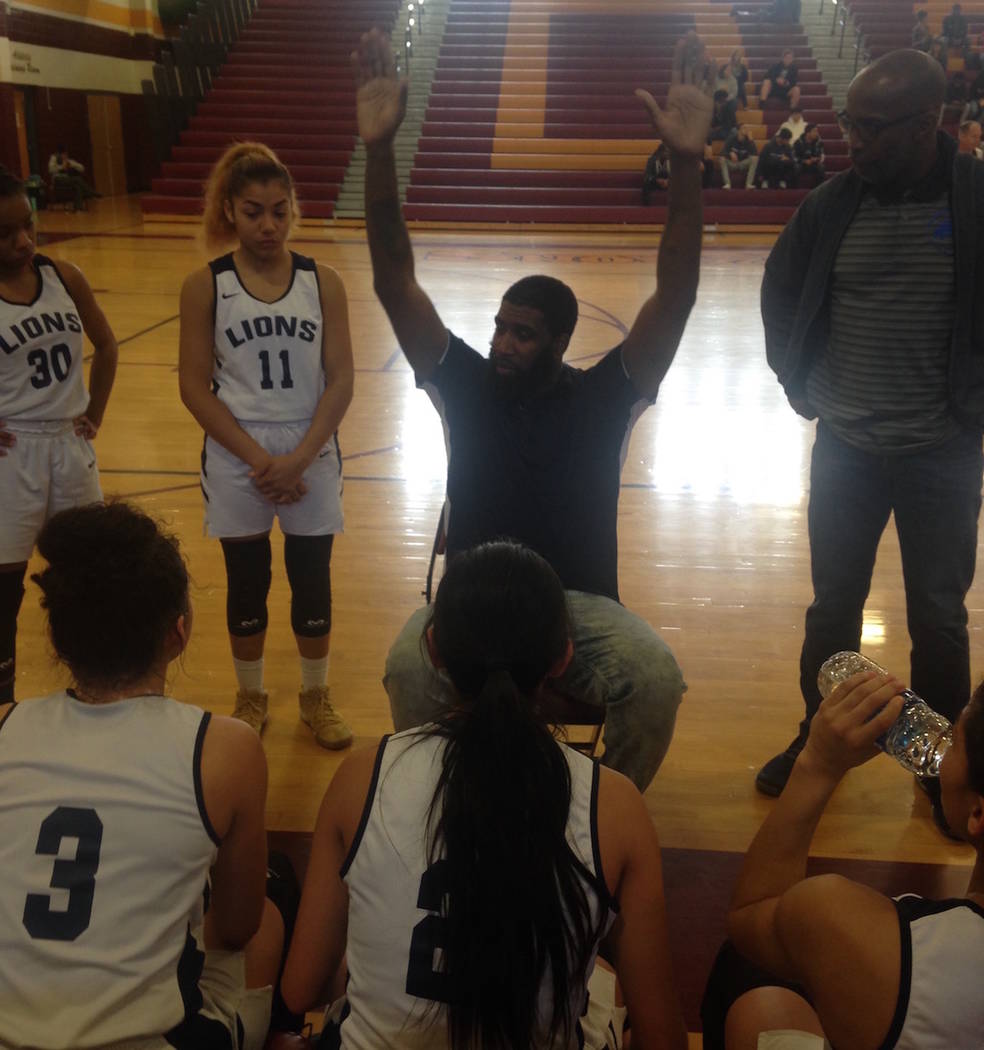 Calvary Chapel coach Shay Johnson talks to his team during the Lions' 40-33 win over Lincoln County in the Class 2A Southern Region championship game at Del Sol on Saturday, Feb. 23, 2019. Bartt D ...
