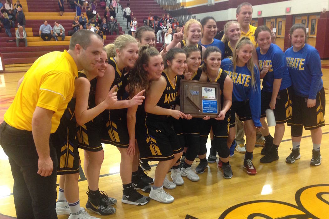 Moapa Valley's girls pose with the Class 3A Southern Region championship trophy after defeating Boulder City, 50-44 on Monday, Feb. 25, 2019 at Del Sol. (Bartt Davis/Las Vegas Review-Journal)