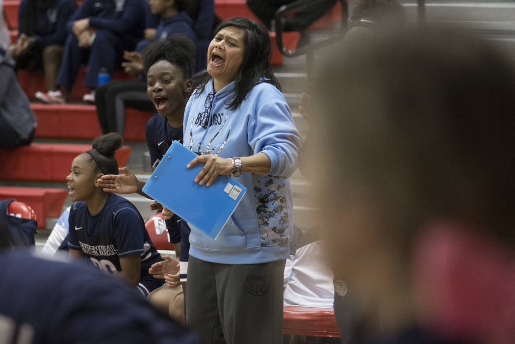 The Centennial bench erupts after a big play in the fourth quarter during the Bulldogs game with Bishop Gorman during the Southern Nevada girls basketball championship game on Monday, Feb. 25, 201 ...