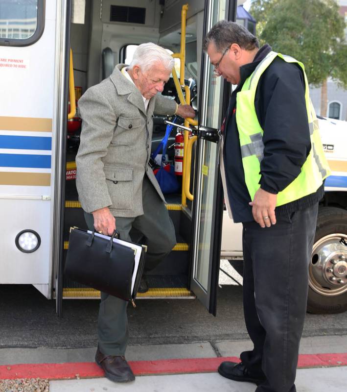 Dr. S. Jay Hazan, 94, a World War II Army veteran, gets off his shuttle as he arrives at the Ll ...