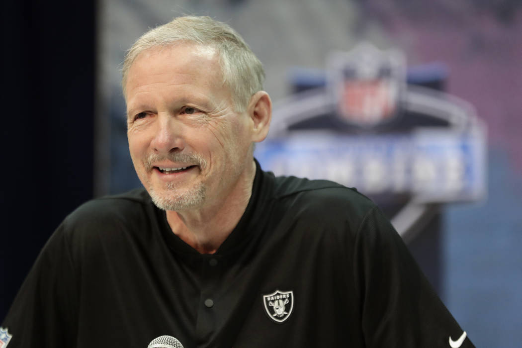 Oakland Raiders general manager Mike Mayock speaks during a press conference at the NFL football scouting combine in Indianapolis, Wednesday, Feb. 27, 2019. (AP Photo/Michael Conroy)