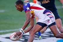 Perry Baker of the United States scores a try against Argentina during the HSBC USA Sevens rugby tournament Cup Final's in Las Vegas on Sunday, March 4, 2018. Richard Brian Las Vegas Review-Journa ...