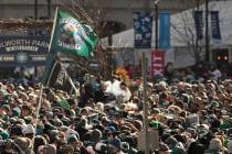 Philadelphia Eagles' fans wait to celebrate during a Super Bowl victory parade, Thursday, Feb. 8, 2018, in Philadelphia. The Eagles beat the New England Patriots 41-33 in Super Bowl 52. (AP Photo/ ...