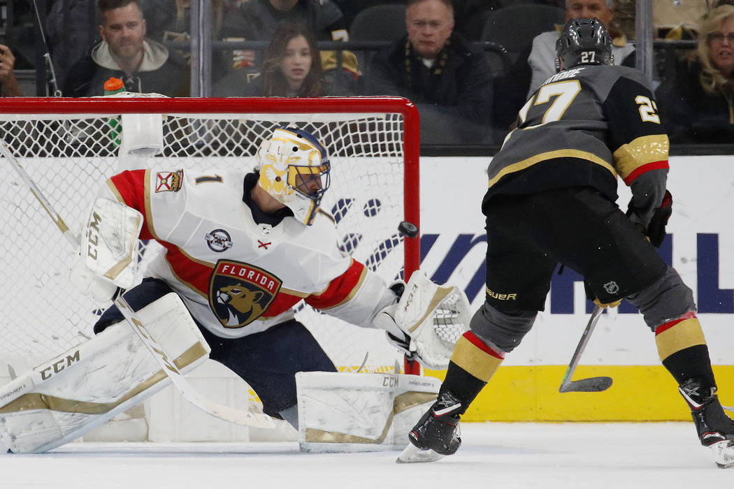 Vegas Golden Knights defenseman Shea Theodore (27) scores on Florida Panthers goaltender Roberto Luongo (1) during the shootout in an NHL hockey game Thursday, Feb. 28, 2019, in Las Vegas. (AP Pho ...