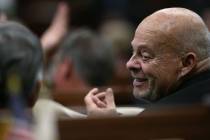 Nevada Assemblyman Jim Wheeler, R-Gardnerville, applauds as Gov. Steve Sisolak gives a shout-out to the Golden Knights during his State of the State address in Carson City on Jan. 16, 2019. (Cathl ...