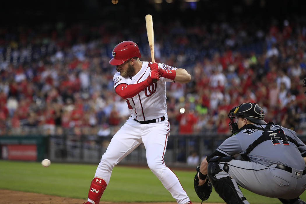 Washington Nationals Bryce Harper strikes out looking during the fifth inning of the team's baseball game against the Miami Marlins in Washington, Wednesday, Sept. 26, 2018. (AP Photo/Manuel Balce ...