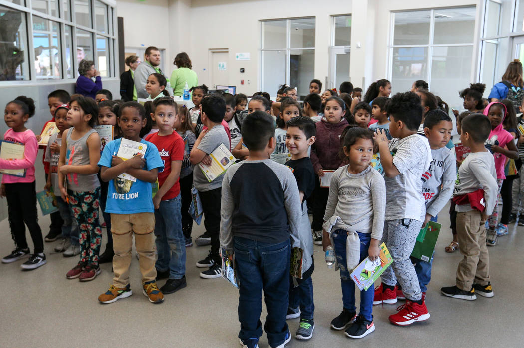First-graders are gathered before they participate in the 4th Annual "Reading to Dogs in Kennels"event at The Animal Foundation during Nevada Reading Week in Las Vegas, Thursday, Feb. 28, 2019. (C ...