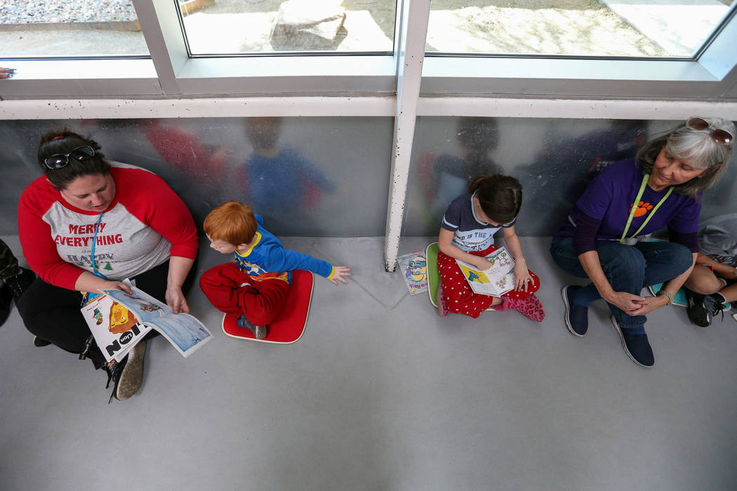 First-graders participate in the 4th Annual "Reading to Dogs in Kennels" event at The Animal Foundation during Nevada Reading Week in Las Vegas, Thursday, Feb. 28, 2019. (Caroline Brehman/Las Vega ...