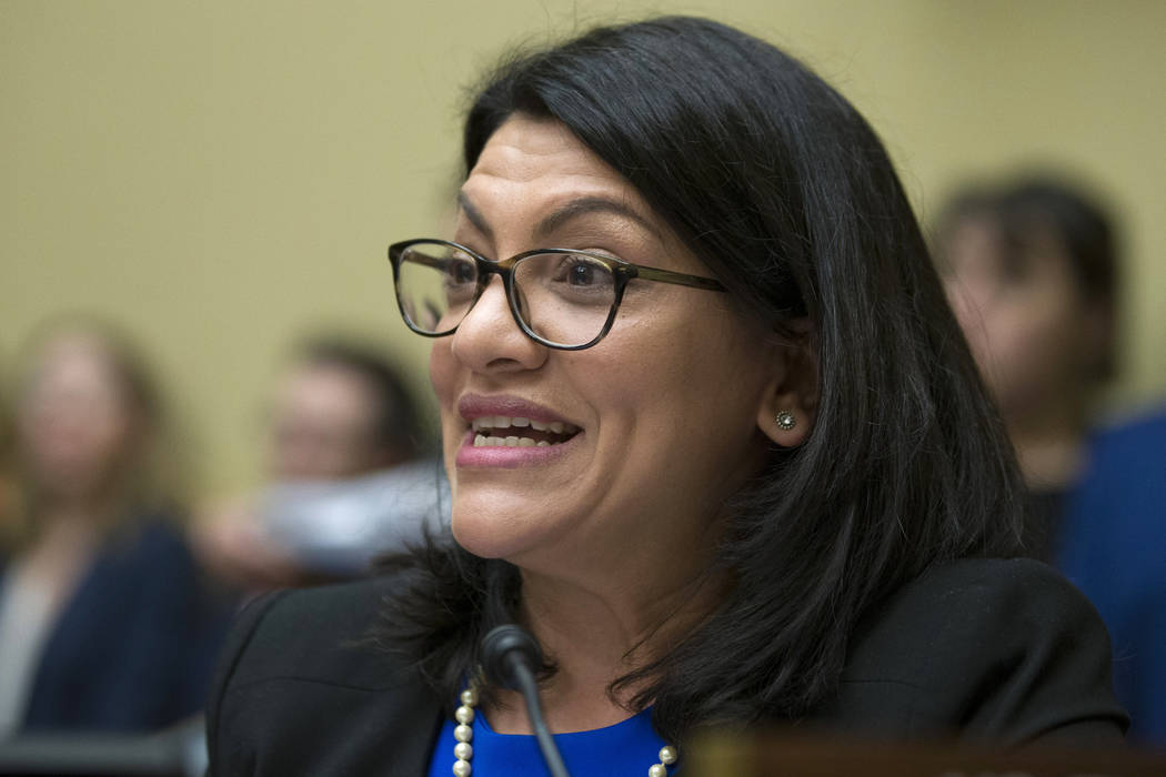 Rep. Rashida Tlaib, D-Mich., questions Michael Cohen, President Donald Trump's former lawyer, as he testifies before the House Oversight and Reform Committee, on Capitol Hill, Wednesday, Feb. 27, ...
