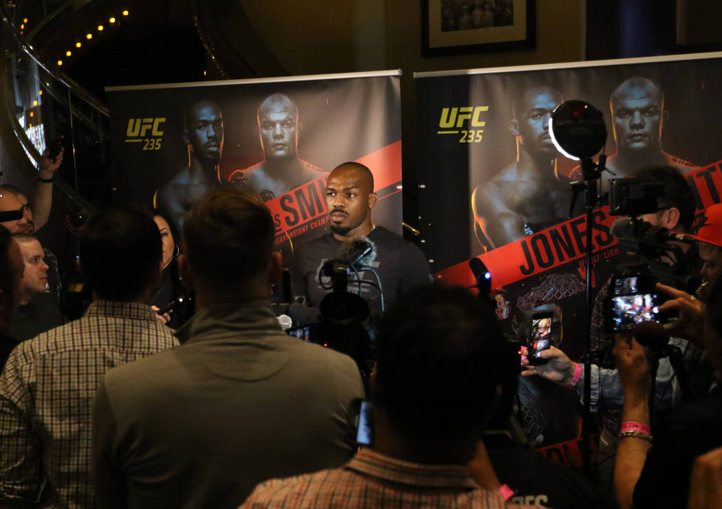 UFC light heavyweight champion Jon Jones listens to questions during a media scrum at UFC 235 open workouts at the MGM Grand hotel-casino in Las Vegas, Thursday, Feb. 28, 2019. (Heidi Fang /Las Ve ...