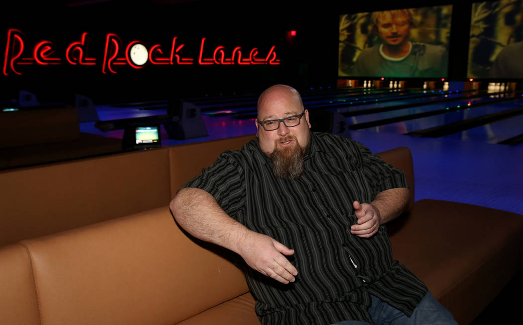 Red Rock Lanes Bowling Operations Manager Dennis Mathews talks to a reporter in the VIP lanes i ...