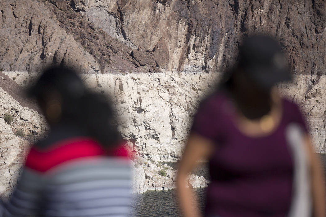 The "bathtub ring" is seen on the rocks in the background as people visit the Hoover Dam at Lake Mead National Recreation Area on Sunday, Oct. 14, 2018. Richard Brian Las Vegas Review-Journal @veg ...
