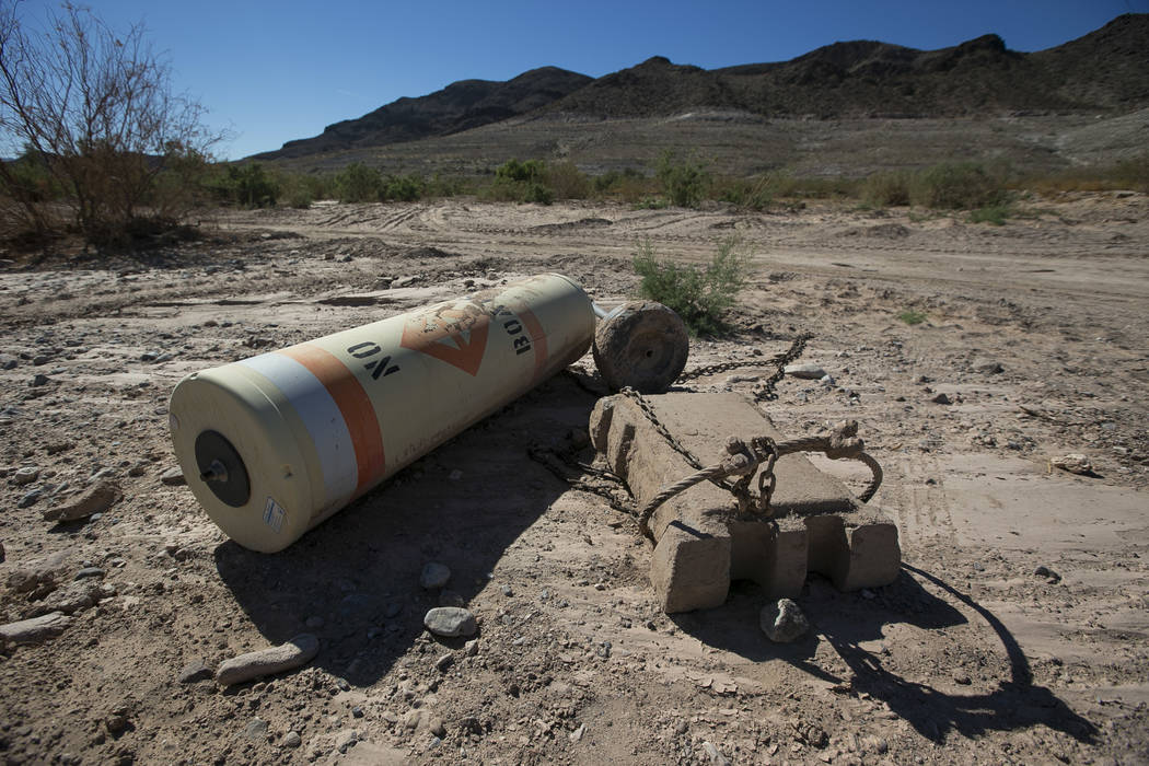A buoy is seen high and dry near the defunct Echo Bay Marina at Lake Mead National Recreation on Thursday, Sept. 27, 2018. Richard Brian Las Vegas Review-Journal @vegasphotograph