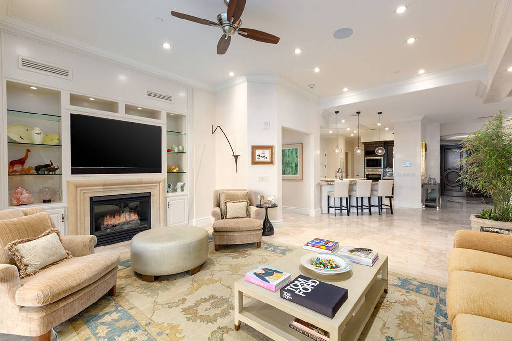 The home's great room features a gas fireplace. (Ivan Sher Group)