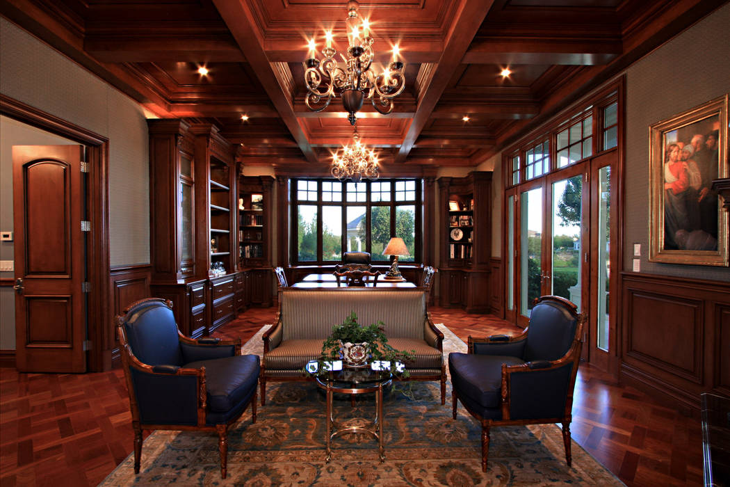 This home office was designed for a business owner who splits time between his home and his corporate office. He often meets here with his business partners or employees, so the Grant Design Group ...