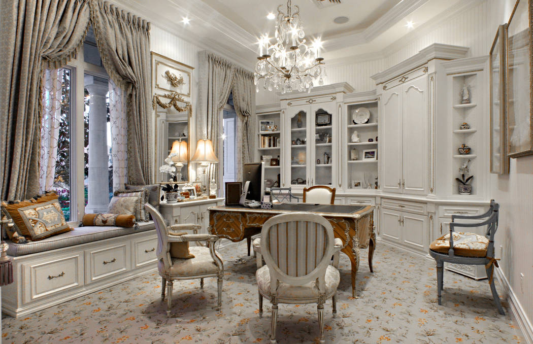 This home office belongs to a woman who loves the traditional French
