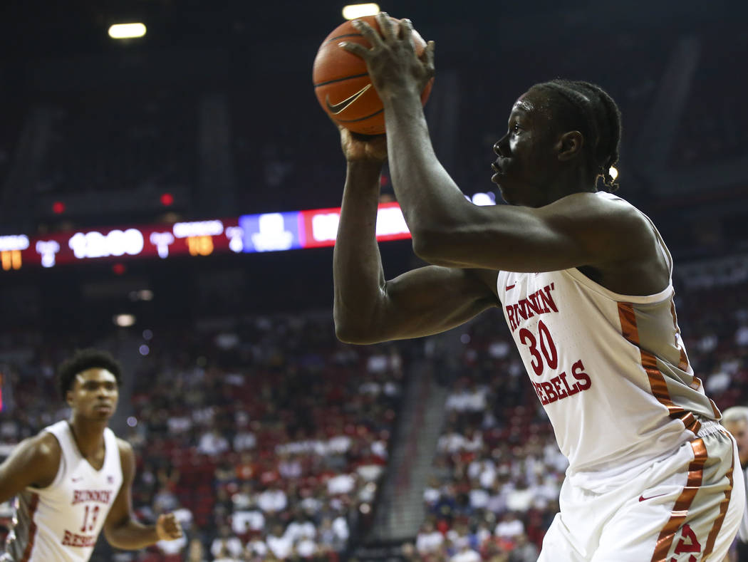 UNLV Rebels forward Jonathan Tchamwa Tchatchoua (30) lines up a shot against Boise State during the first half of a basketball game at the Thomas & Mack Center in Las Vegas on Saturday, March ...