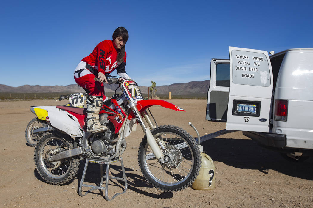 Angie Wright starts her bike at Western Raceway track outside White Hills, Arizona, Sunday, Feb. 24, 2019. Wright will be racing in the Mint 400's motorcycle race, the first dirt bike race for the ...