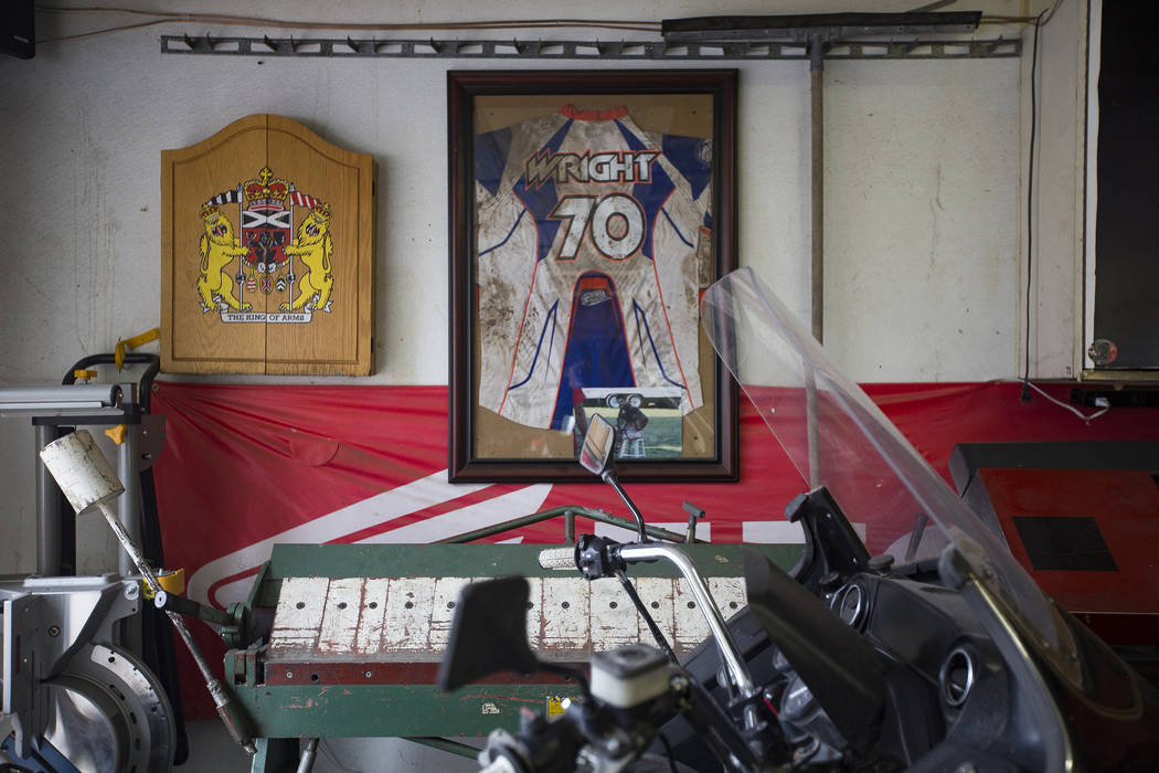 Angie's brother Chris Wright's jersey hangs on the wall in her father's garage in Henderson, Wednesday, March 6, 2019. Angie will be racing in the Mint 400's motorcycle race, the first dirt bike r ...