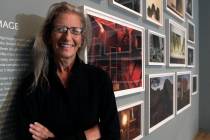 Annie Leibovitz stands near some of her work before the opening of her exhibition at the Wexner ...