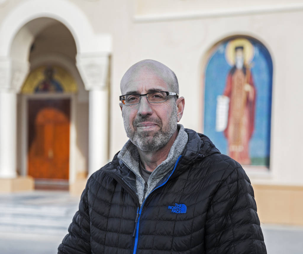 Parish council member John Koutsulis oversees the cats adopted through the Animal Foundation's "Working Cat" program at St. John the Baptist Greek Orthodox Church in Las Vegas. (Benjamin Hager Rev ...