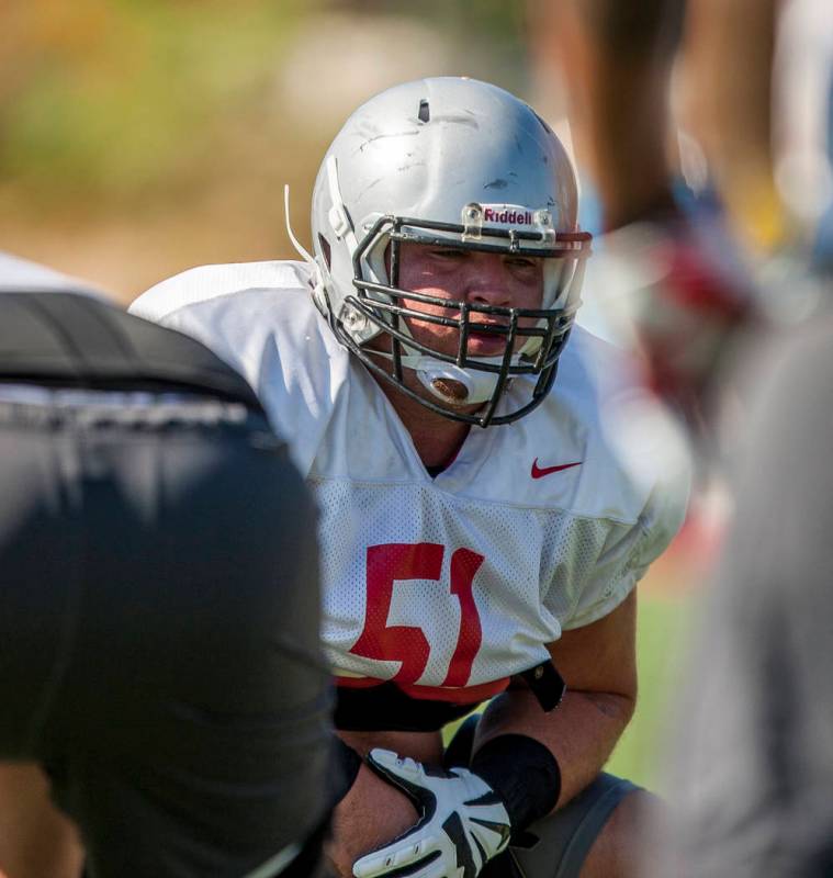 UNLV center Zack Singer prepares to practice a play during training camp at Rebel Park on Tuesday, Aug. 8, 2017. Patrick Connolly Las Vegas Review-Journal @PConnPie