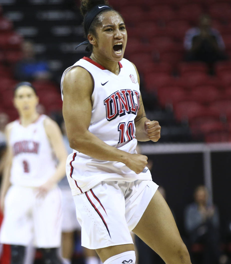UNLV Lady Rebels guard Nikki Wheatley (10) celebrates after scoring against the UNR Wolf Pack during the first half of a basketball game in the Mountain West tournament quarterfinals at the Thomas ...