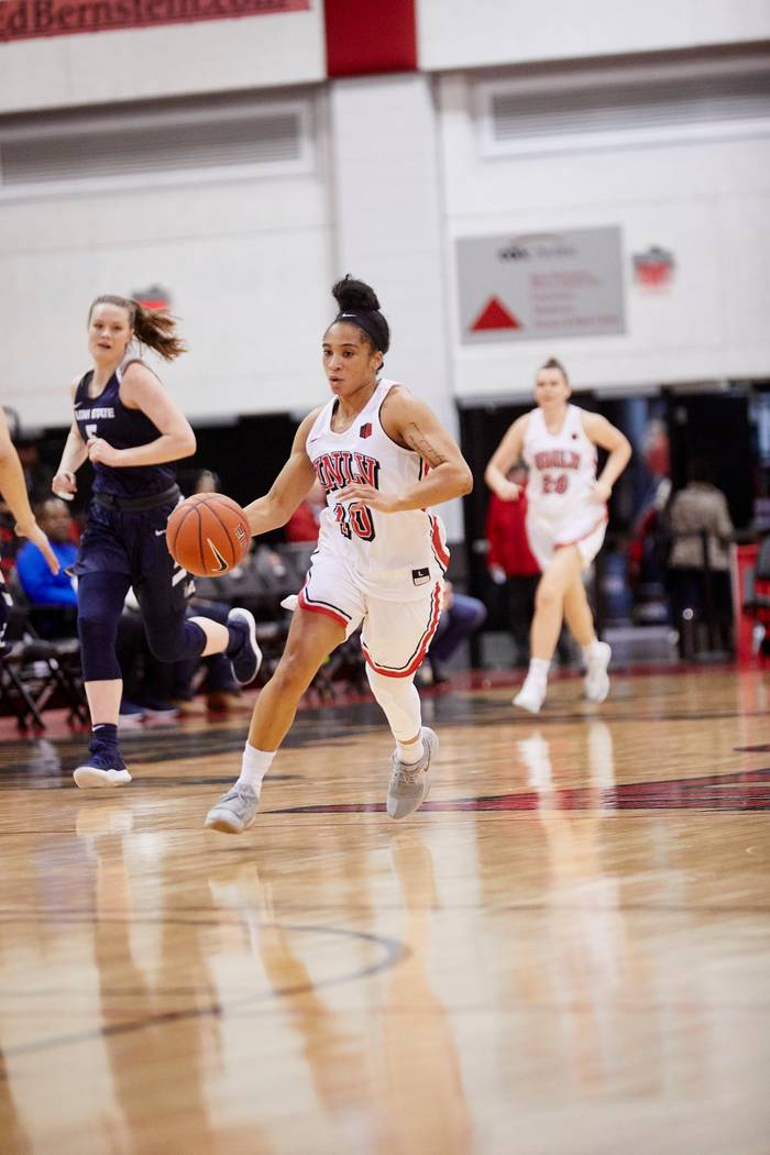 UNLV point guard Nikki Wheatley plays against Utah State on Feb. 2 at Cox Pavilion. Courtesy of UNLV Photo Services.
