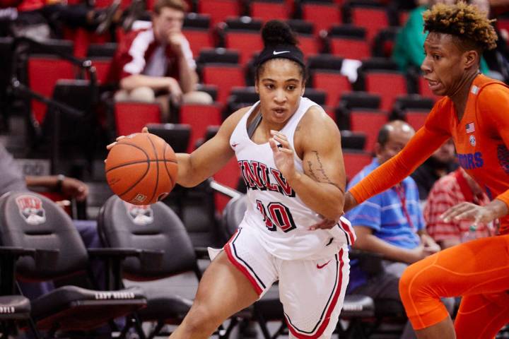 UNLV point guard Nikki Wheatley in action against Florida on Dec. 21 at Cox Pavilion. Courtesy of UNLV Photo Services.