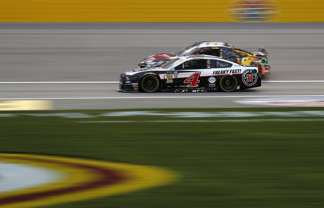 Kevin Harvick (4) drives during qualifying for a NASCAR Cup Series auto race at the Las Vegas Motor Speedway, Friday, March 1, 2019, in Las Vegas. (AP Photo/John Locher)