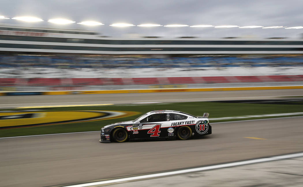 Kevin Harvick (4) drives down pit lane during qualifying for a NASCAR Cup Series auto race at the Las Vegas Motor Speedway, Friday, March 1, 2019, in Las Vegas. (AP Photo/John Locher)