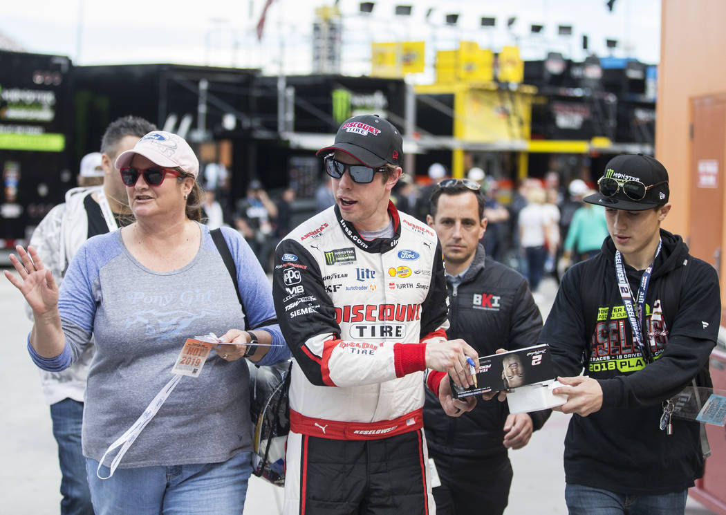 Brad Keselowski, middle, walks in pit row after completing his practice run on Saturday, March 2, 2019, at Las Vegas Motor Speedway, in Las Vegas. (Benjamin Hager Review-Journal) @BenjaminHphoto