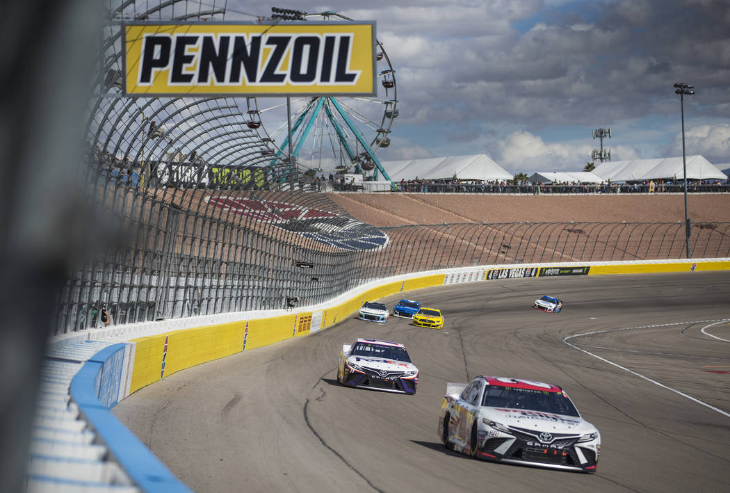 Erik Jones (20) leads a pack of racers during the Monster Energy NASCAR Cup Series Pennzoil 400 on Sunday, March 3, 2019, at Las Vegas Motor Speedway, in Las Vegas. (Benjamin Hager Review-Journal) ...