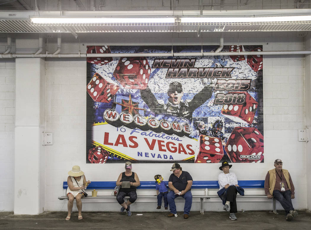 Attendees take a break under the bleachers during the Monster Energy NASCAR Cup Series Pennzoil 400 on Sunday, March 3, 2019, at Las Vegas Motor Speedway, in Las Vegas. (Benjamin Hager Review-Jour ...