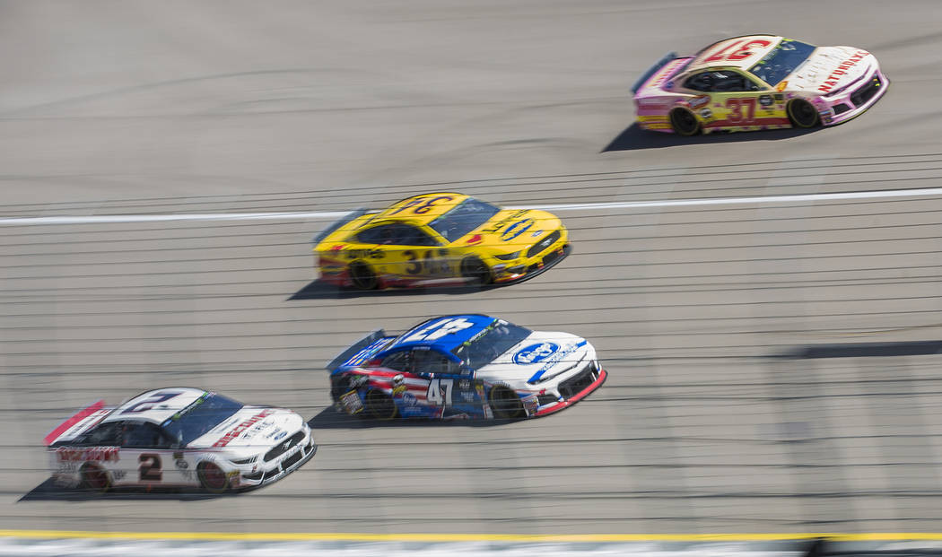 Brad Keselowski (2), Ryan Preece (47), Michael McDowell (34) and Chris Buescher (37) compete for position during the Monster Energy NASCAR Cup Series Pennzoil 400 on Sunday, March 3, 2019, at Las ...