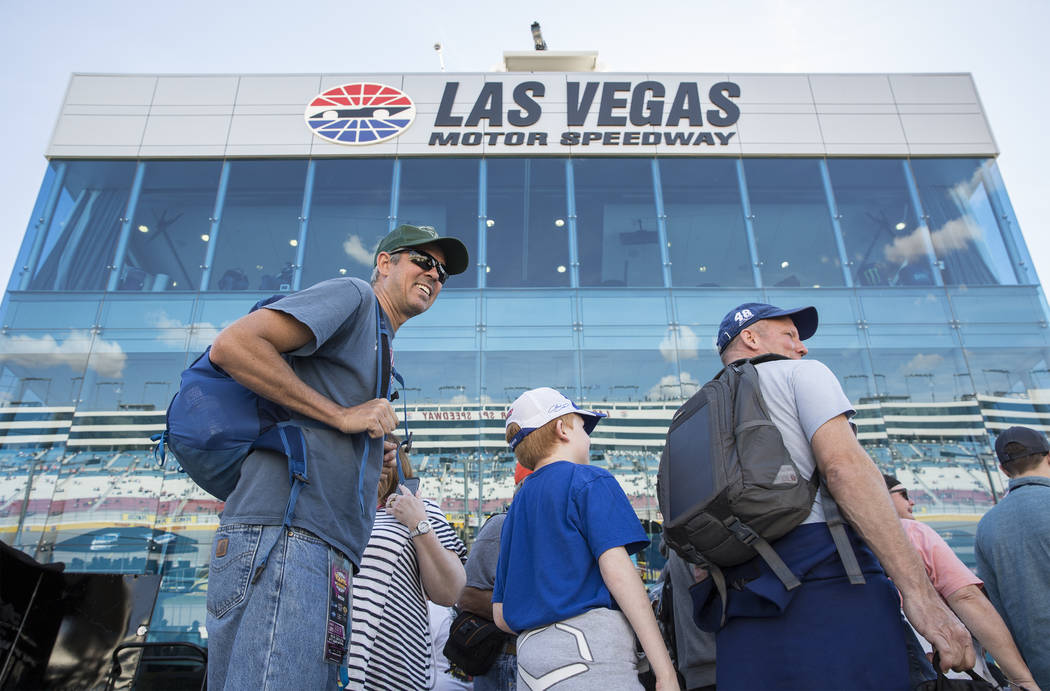 Attendees walk on pit row before the start of the Monster Energy NASCAR Cup Series Pennzoil 400 on Sunday, March 3, 2019, at Las Vegas Motor Speedway, in Las Vegas. (Benjamin Hager Review-Journal) ...